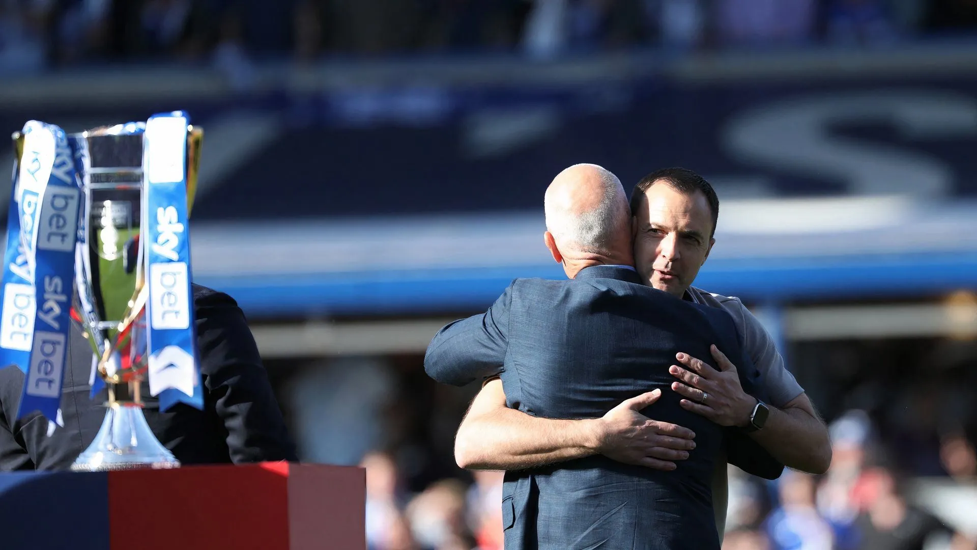 Tom Wagner embraces Chris Davies